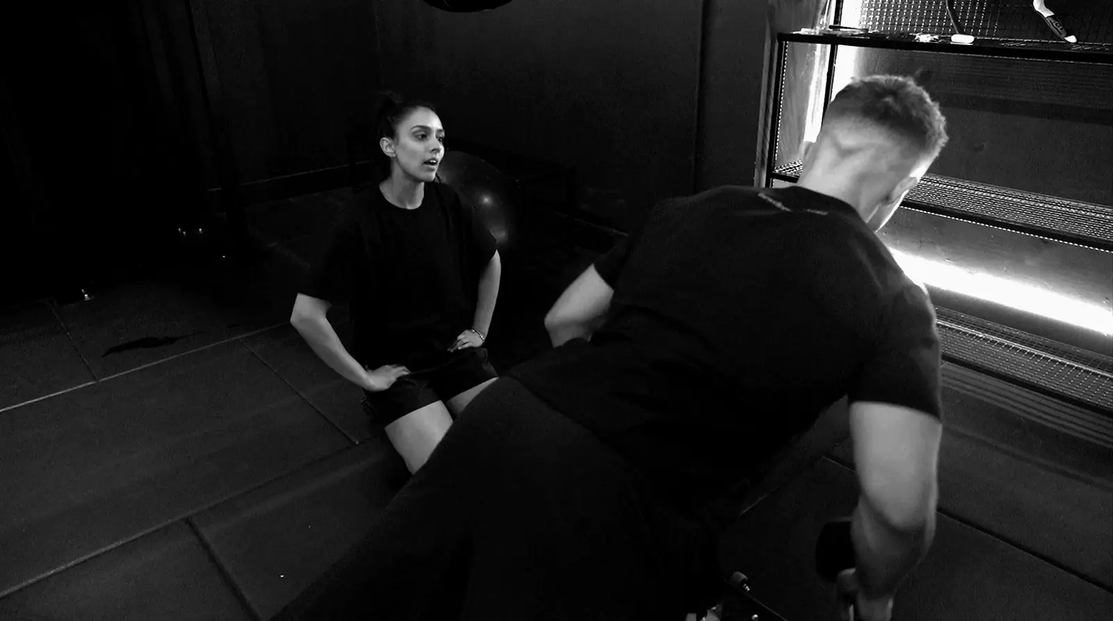 Ryan Crockett coaching a client through an assessment at Solo 60